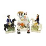 A collection of Staffordshire flat back figures,