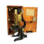 An Ernst Leitz Wetzlar brass and black lacquered microscope,