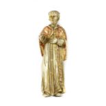 A carved wood and gilt figure of a saint,