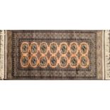 A hand knotted Kashmir Bokhara silk and woollen rug,