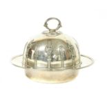 A silver muffin dish and cover,