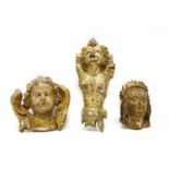 Three giltwood and painted carvings,