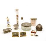 An early 20th century bone pin cushion and button winders,