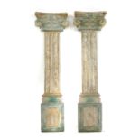 A pair of carved wood painted and gilt pilasters,