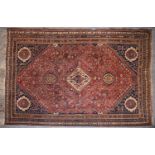 A wool and silk Persian rug,