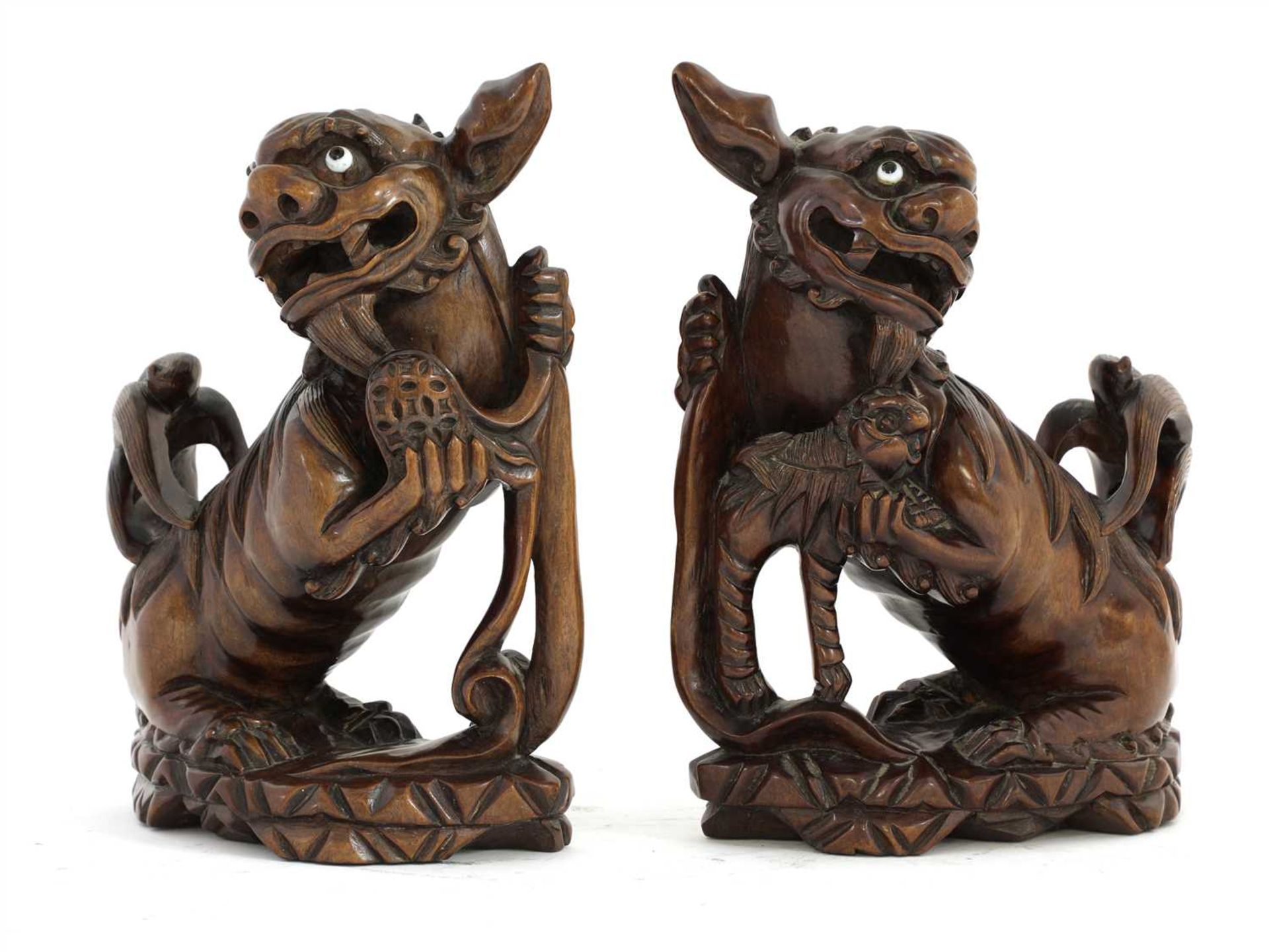 A pair of Chinese wood carvings,