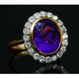 An amethyst and diamond oval cluster ring,