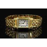 A ladies' 18ct gold diamond set Jaeger-LeCoultre Reverso quartz bracelet watch,