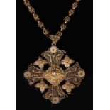 A Continental gold filigree pendant and chain,