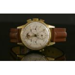 A gentlemen's 14ct gold, Universal Geneve tri-complex triple date moon phase mechanical Chronograph