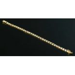 An 18ct gold ruby and diamond bracelet, c.1970,