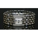 A ladies' stainless steel diamond set Chaumet Khesis quartz bracelet watch,