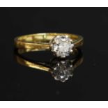 An 18ct gold single stone diamond ring,