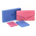 A Smythson pink leather document holder and passport holder