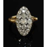 A late Victorian diamond set marquise shaped cluster ring, c.1900,