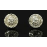 A pair of diamond set cluster stud earrings,