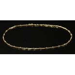 An 18ct gold diamond set bar link necklace, c.2009