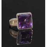 A Continental white gold single stone amethyst ring,