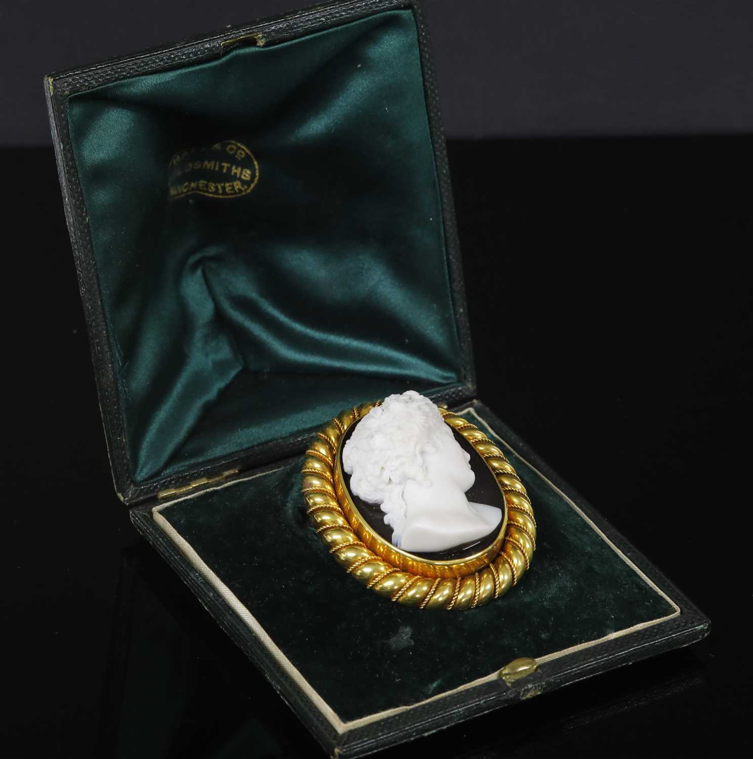 A cased Victorian gold carved hardstone cameo brooch, - Image 2 of 2