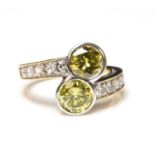 Two stone yellow diamond crossover ring,