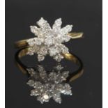 An 18ct gold diamond set snowflake cluster ring,