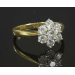 An 18ct gold diamond set cluster ring,