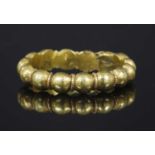 A medieval-style gold finger ring,