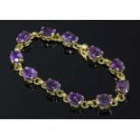 A gold amethyst bracelet,