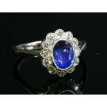 A platinum sapphire and diamond cluster ring,