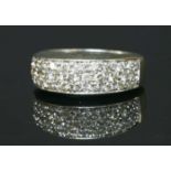 A 9ct gold pavé set diamond tapered band ring,