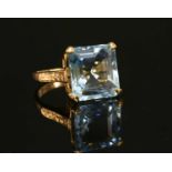 A single stone aquamarine ring,