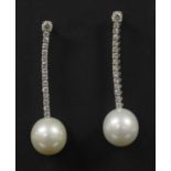 A pair of Continental white gold cultured South Sea pearl and diamond drop earrings,