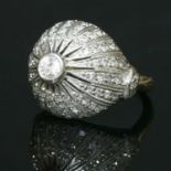 A Continental diamond set bombé ring,