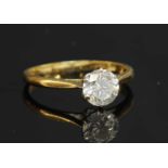 An 18ct gold single stone diamond ring,