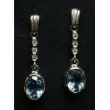 A pair of 18ct white gold aquamarine and diamond drop earrings,