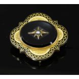 A Victorian gold elongated quatrefoil onyx set brooch pendant, c.1860,