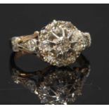 An Edwardian rose gold and silver diamond set cluster ring, c.1905,