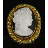 A cased Victorian gold carved hardstone cameo brooch,