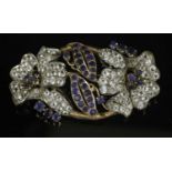 A Continental gold and silver, blue and white sapphire oval form spray brooch,