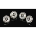 A pair of Continental Art Deco gold, platinum, diamond, mother of pearl and enamel cufflinks,