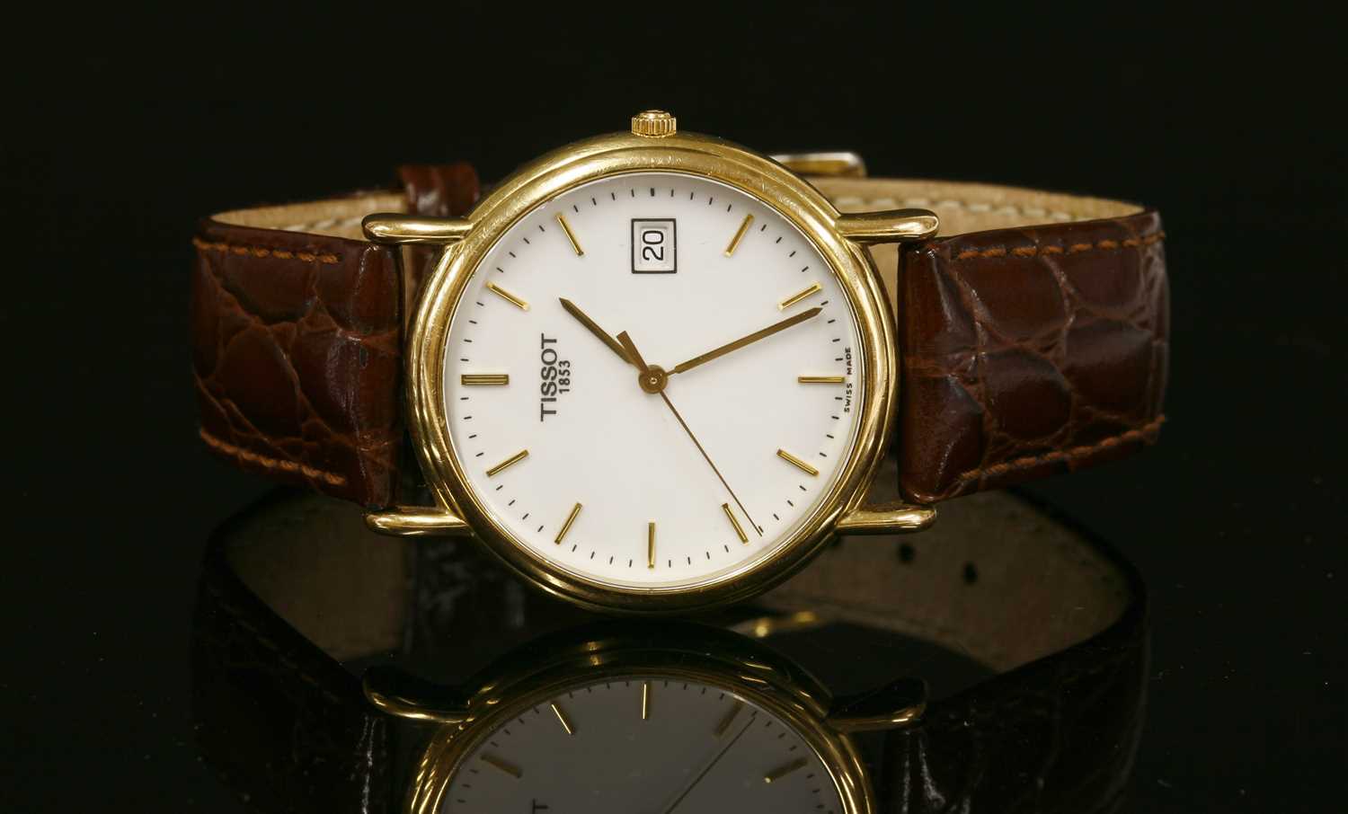 A gentlemen's 18ct gold Tissot 1853 quartz strap watch, c.2004,