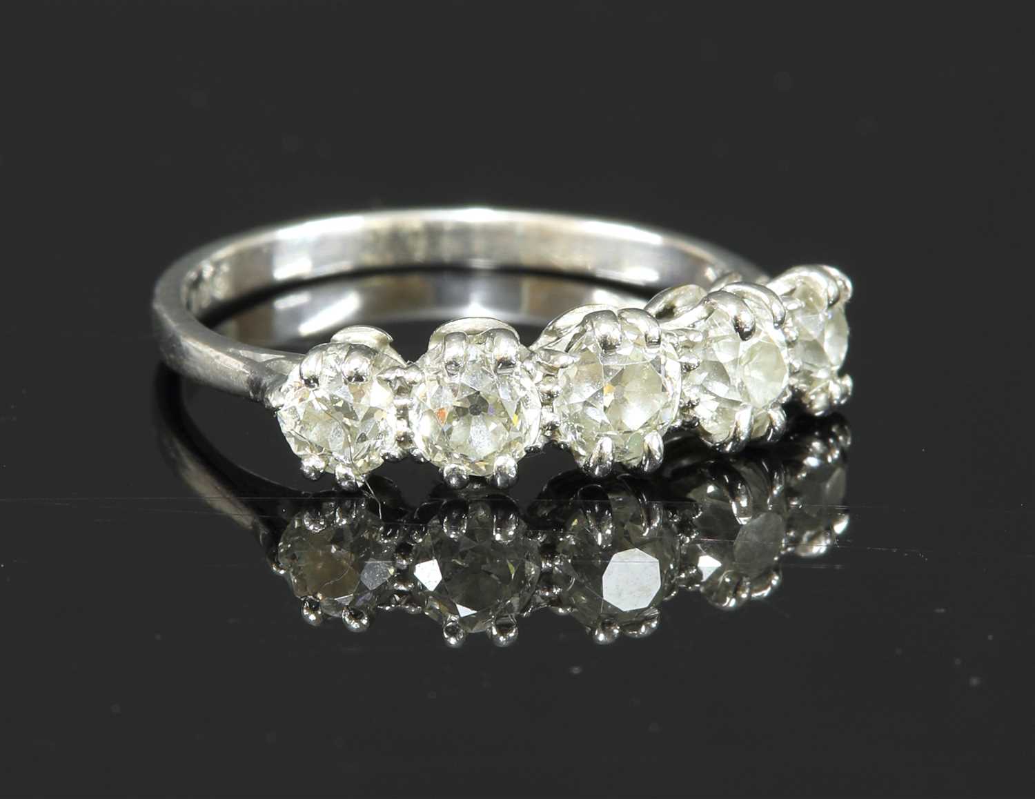 A five stone graduated diamond ring,