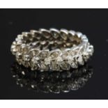 A three row diamond ring,