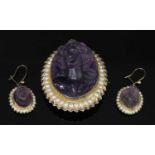 A Victorian gold carved amethyst cameo and split pearl brooch,