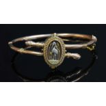 A late Victorian Aesthetic Movement crossover hinged bangle,