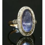 A sapphire and diamond oval cluster ring,