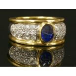A gentlemen's two colour gold sapphire and diamond ring,