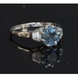 A single stone aquamarine ring,