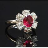 A platinum unheated ruby and diamond daisy cluster ring,