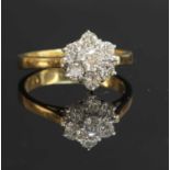 An 18ct gold diamond set daisy cluster ring,